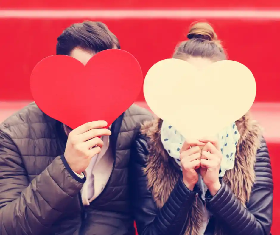 Couple holding a heart